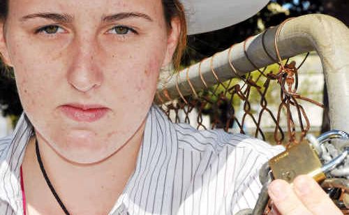 WSHS student Emma Thompson’s plan to protest the school’s dumping their EKKA cattle entry with 900kg bull Southern Cross Joe were foiled by chains and padlocks yesterday. WSHS student Emma Thompson’s plan to protest the school’s dumping their EKKA cattle entry with 900kg bull Southern Cross Joe were foiled by chains and padlocks yesterday.